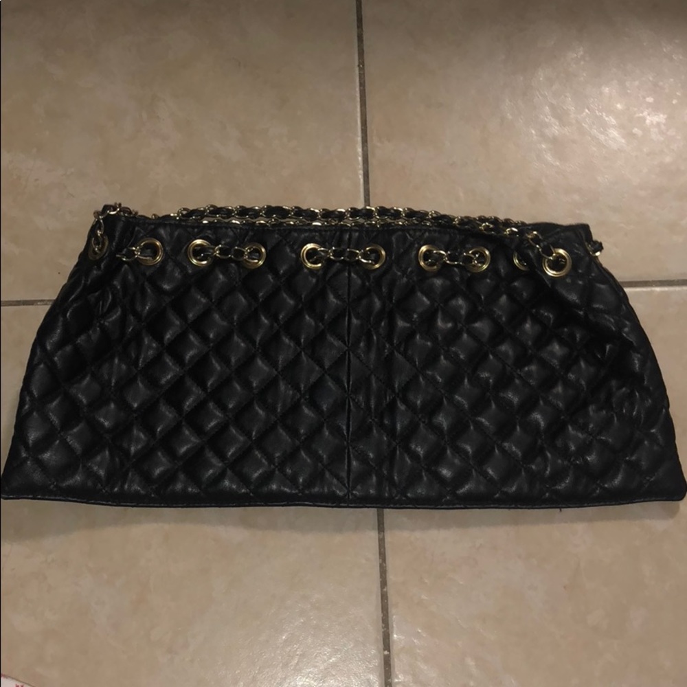 Black cushion purse gold details